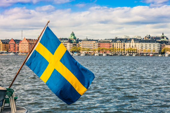 Stockholm view to downtown with a Swedish flag